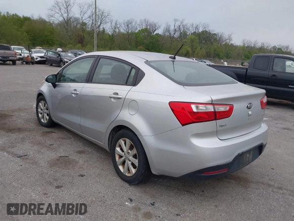 2013 Kia Rio SX with VIN KNADN4A3XD6168179, listed as a IAAI auction lot 41909704 with 79,653 mi miles. Bid and sale history available at carsss.com. Image 3.