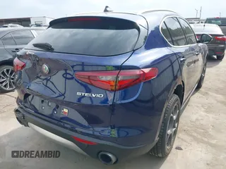 2019 Alfa Romeo Stelvio z VIN ZASPAKAN0K7C44623, wystawiony jako IAAI lot #42062414 z przebiegiem 68 722 mil mil oraz . Historia ofert i sprzedaży dostępna na DreamBid. Obrazek 4.
