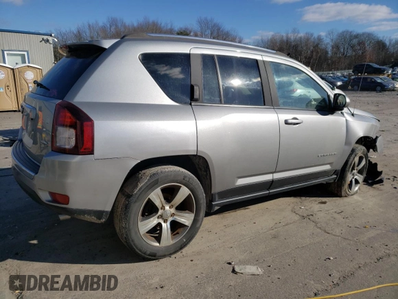 2016 Jeep Compass Latitude with VIN 1C4NJDEB2GD697923, listed as a Copart auction lot 84081394 with 167,240 mi miles and Salvage Title. Bid and sale history available at carsss.com. Image 3.