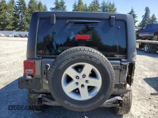 2018 Jeep Wrangler JK Unlimited Sport S with VIN 1C4HJWDG7JL929337, listed as a Copart auction lot 69376174 with 101,313 mi miles and Salvage Title. Bid and sale history available at carsss.com. Image 6.