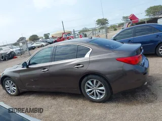 2014 Infiniti Q50 Sport with VIN JN1BV7ARXEM690925, listed as a IAAI auction lot 42163630 with 130,931 mi miles and . Bid and sale history available at carsss.com. Image 14.