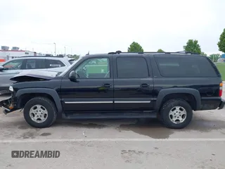 2004 Chevrolet Suburban LT z VIN 1GNFK16ZX4J291419, wystawiony jako IAAI lot #42163331 z przebiegiem 235 054 mil mil oraz . Historia ofert i sprzedaży dostępna na DreamBid. Obrazek 14.