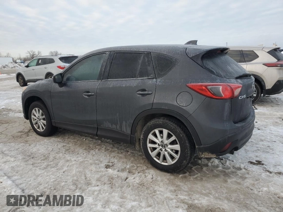 2015 Mazda CX-5 Sport with VIN JM3KE2BE2F0541436, listed as a Copart auction lot 87596785 with 197,310 mi miles and Salvage Title. Bid and sale history available at carsss.com. Image 2.
