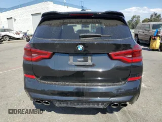 2021 BMW X3 M with VIN 5YMTS0C05M9F31855, listed as a Copart auction lot 71724374 with 30,814 mi miles and Salvage Title. Bid and sale history available at carsss.com. Image 6.