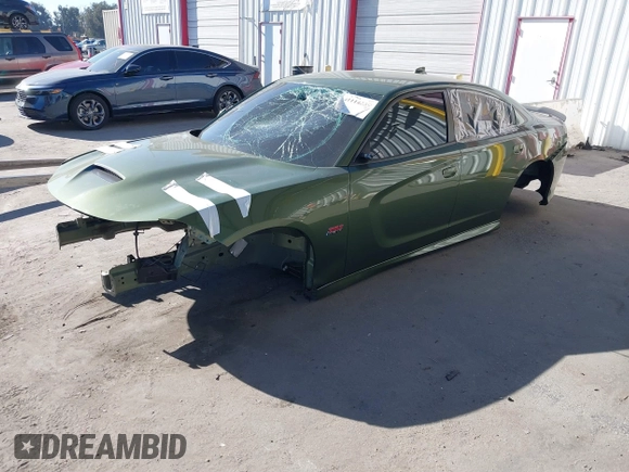 2021 Dodge Charger Scat Pack Widebody with VIN 2C3CDXGJ4MH559324, listed as a IAAI auction lot 41114230 with 1 mi miles. Bid and sale history available at carsss.com. Image 2.
