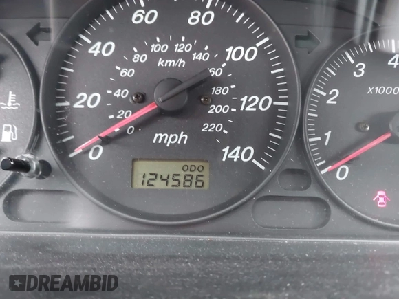 2000 Mazda Protege DX with VIN JM1BJ2224Y0277889, listed as a IAAI auction lot 41160593 with 124,586 mi miles and . Bid and sale history available at DreamBid. Image 15.