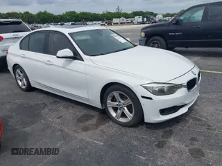 2013 BMW 3 Series 328i with VIN WBA3A5G51DNP26142, listed as a IAAI auction lot 41767977 with 129,440 mi miles. Bid and sale history available at carsss.com. Image 1.