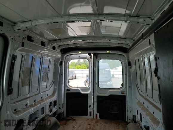 2015 Ford Transit with VIN 1FTNR2CV0FKA63935, listed as a Copart auction lot 58589985 with 190,246 mi miles and Salvage title. Bid and sale history available at DreamBid. Image 10.