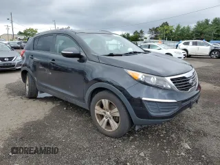 2011 Kia Sportage LX with VIN KNDPBCA24B7012852, listed as a Copart auction lot 63837085 with 186,805 mi miles and Salvage title. Bid and sale history available at DreamBid. Image 4.