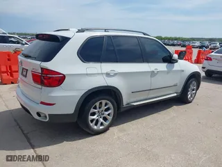 2011 BMW X5 35i with VIN 5UXZV4C57BL401794, listed as a IAAI auction lot 41897040 with 1 mi miles. Bid and sale history available at carsss.com. Image 4.