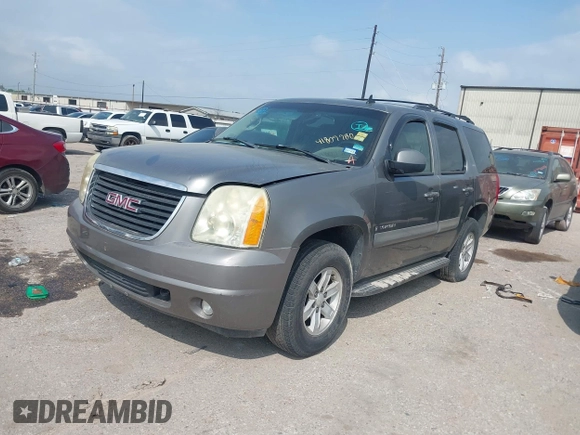 2008 GMC Yukon SLT w/4SB with VIN 1GKFC13J08R137057, listed as a IAAI auction lot 41809980 with 239,105 mi miles. Bid and sale history available at carsss.com. Image 2.