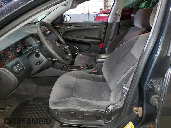2015 Chevrolet Impala LS with VIN 2G1WA5E36F1171137, listed as a Copart auction lot 63060935 with 148,000 mi miles and Salvage title. Bid and sale history available at DreamBid. Image 7.