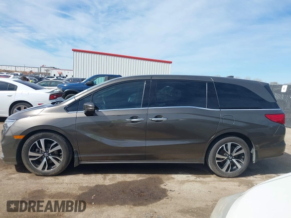 2018 Honda Odyssey Elite with VIN 5FNRL6H96JB069458, listed as a IAAI auction lot 41687526 with 41,004 mi miles and . Bid and sale history available at DreamBid. Image 14.