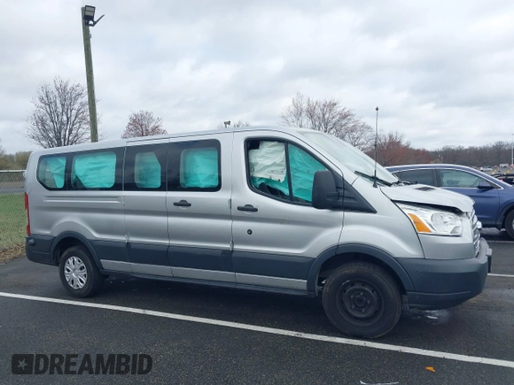 2018 Ford Transit Passenger XL z VIN 1FBZX2ZM2JKB02141, wystawiony jako IAAI lot #41914073 z przebiegiem 103 718 mil mil oraz . Historia ofert i sprzedaży dostępna na DreamBid. Obrazek 13.