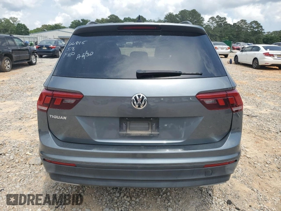 2020 Volkswagen Tiguan S with VIN 3VV1B7AX5LM176421, listed as a Copart auction lot 57229715 with 72,048 mi miles and Salvage title. Bid and sale history available at DreamBid. Image 6.
