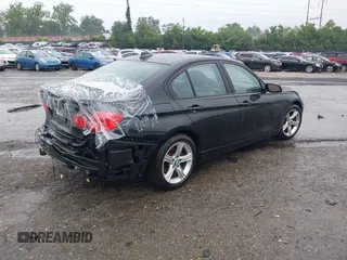 2014 BMW 3 Series 328i xDrive with VIN WBA3B5G58ENS06227, listed as a IAAI auction lot 42611833 with 79,509 mi miles and . Bid and sale history available at DreamBid. Image 4.