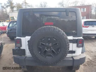 2013 Jeep Wrangler Unlimited Sport with VIN 1C4BJWDG1DL695934, listed as a IAAI auction lot 41691295 with 141,627 mi miles. Bid and sale history available at carsss.com. Image 16.