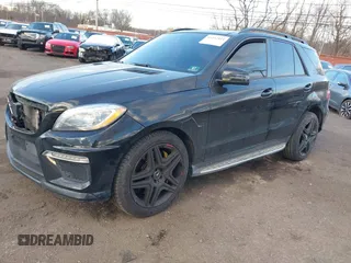 2014 Mercedes-Benz M 63 AMG z VIN 4JGDA7EBXEA306024, wystawiony jako IAAI lot #41452811 z przebiegiem 98 510 mil mil oraz . Historia ofert i sprzedaży dostępna na DreamBid. Obrazek 2.