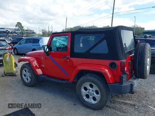 2014 Jeep Wrangler Sahara with VIN 1C4AJWBG0EL109773, listed as a IAAI auction lot 41678412 with 12,264 mi miles and . Bid and sale history available at DreamBid. Image 14.