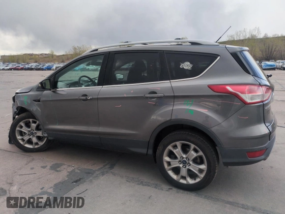 2014 Ford Escape Titanium with VIN 1FMCU9J97EUB30467, listed as a Copart auction lot 54949035 with 112,013 mi miles and Salvage Title. Bid and sale history available at DreamBid. Image 2.