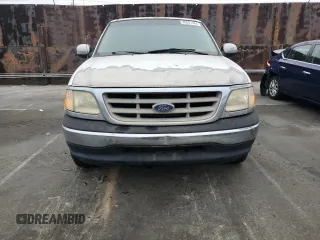 2000 Ford F-150 XL with VIN 1FTRX17L5YKA74815, listed as a Copart auction lot 85821444 with 0 mi miles and Salvage Title. Bid and sale history available at carsss.com. Image 5.