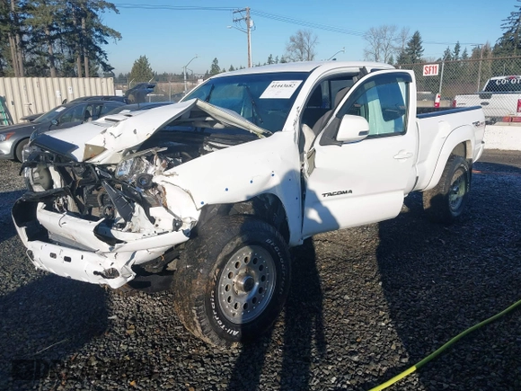 2014 Toyota Tacoma with VIN 5TFUU4EN1EX088377, listed as a IAAI auction lot 41443682 with 67,185 mi miles and . Bid and sale history available at DreamBid. Image 2.