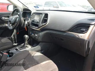 2016 Jeep Cherokee Sport with VIN 1C4PJLAB5GW297349, listed as a IAAI auction lot 42367544 with 142,930 mi miles and . Bid and sale history available at DreamBid. Image 5.
