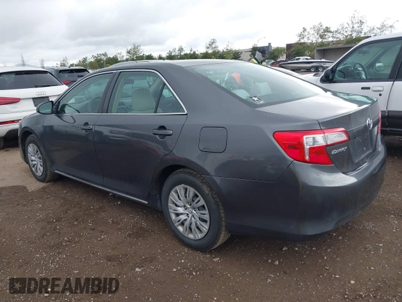 2014 Toyota Camry L with VIN 4T1BF1FK5EU403313, listed as a IAAI auction lot 42141338 with 185,925 mi miles and . Bid and sale history available at DreamBid. Image 3.