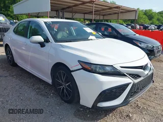 2023 Toyota Camry SE with VIN 4T1G11AK2PU749916, listed as a IAAI auction lot 42014107 with 61,561 mi miles. Bid and sale history available at carsss.com. Image 1.