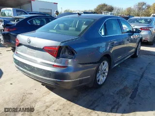 2017 Volkswagen Passat 1.8T SE w/Technology with VIN 1VWGT7A39HC066335, listed as a IAAI auction lot 41057523 with 106,771 mi miles. Bid and sale history available at carsss.com. Image 4.