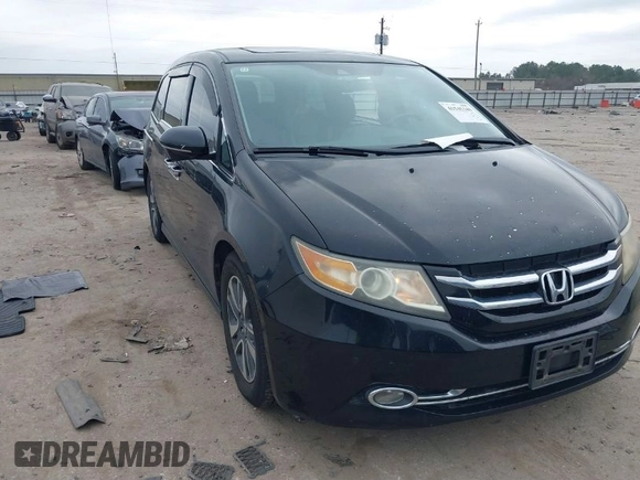 2014 Honda Odyssey Touring with VIN 5FNRL5H9XEB045695, listed as a IAAI auction lot 41545348 with 131,472 mi miles and . Bid and sale history available at carsss.com. Image 1.