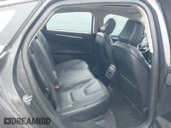 2020 Ford Fusion Titanium with VIN 3FA6P0K97LR192657, listed as a IAAI auction lot 42170258 with 87,696 mi miles and . Bid and sale history available at DreamBid. Image 8.