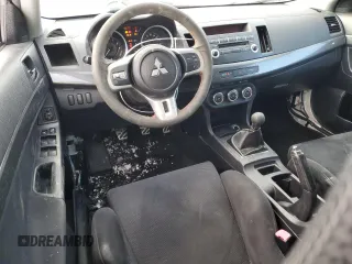 2010 Mitsubishi Lancer Evolution GSR with VIN JA32W8FV4AU604717, listed as a Copart auction lot 83896464 with 140,502 mi miles and Salvage Title. Bid and sale history available at DreamBid. Image 8.