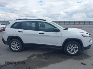 2015 Jeep Cherokee Sport z VIN 1C4PJMAB6FW773872, wystawiony jako IAAI lot #42376516 z przebiegiem 135 209 mil mil oraz . Historia ofert i sprzedaży dostępna na DreamBid. Obrazek 13.