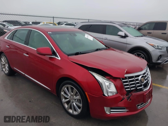 2013 Cadillac XTS Luxury with VIN 2G61P5S32D9115640, listed as a IAAI auction lot 41065284 with 125,643 mi miles and . Bid and sale history available at carsss.com. Image 1.