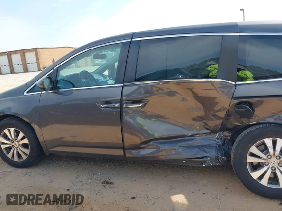 2016 Honda Odyssey EX-L with VIN 5FNRL5H61GB099699, listed as a IAAI auction lot 41807964 with 67,041 mi miles and . Bid and sale history available at DreamBid. Image 14.