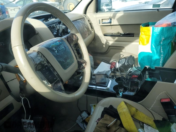 2010 Ford Escape Limited with VIN 1FMCU9E77AKD23121, listed as a Copart auction lot 50243295 with Not provided miles and Salvage title. Bid and sale history available at DreamBid. Image 7.