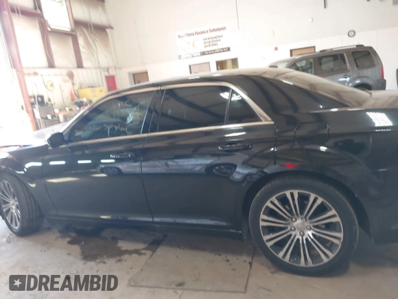 2013 Chrysler 300 with VIN 2C3CCABT1DH503835, listed as a IAAI auction lot 41303335 with 105,606 mi miles. Bid and sale history available at carsss.com. Image 14.