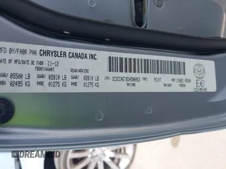 2013 Chrysler 300 with VIN 2C3CCAGT9DH590053, listed as a IAAI auction lot 41800253 with 136,596 mi miles. Bid and sale history available at carsss.com. Image 9.