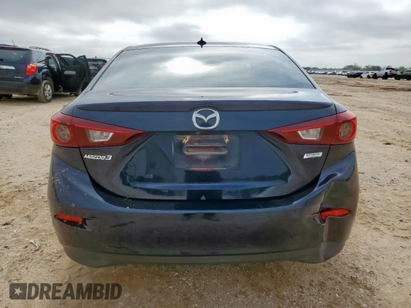 2015 Mazda 3 i Grand Touring with VIN 3MZBM1W77FM219595, listed as a Copart auction lot 61041105 with 140,846 mi miles and Salvage title. Bid and sale history available at DreamBid. Image 6.