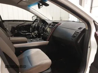 2014 Mazda CX-9 Grand Touring with VIN JM3TB3DA7E0428187, listed as a IAAI auction lot 41247569 with 117,590 mi miles and . Bid and sale history available at DreamBid. Image 5.