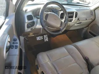 2002 Ford F-150 XL with VIN 1FTRX17L72NA39909, listed as a Copart auction lot 76376994 with 175,926 mi miles and Salvage title. Bid and sale history available at DreamBid. Image 8.