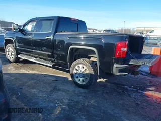 2019 GMC Sierra 2500HD Denali with VIN 1GT12SEYXKF224711, listed as a IAAI auction lot 41407508 with 77,158 mi miles. Bid and sale history available at carsss.com. Image 3.