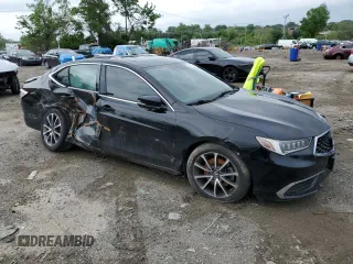 2018 Acura TLX z VIN 19UUB2F34JA005529, wystawiony jako Copart lot #54868315 z przebiegiem Nie podano mil oraz Szkoda całkowita • Salvage title. Historia ofert i sprzedaży dostępna na DreamBid. Obrazek 4.