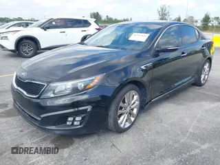 2014 Kia Optima SX Turbo with VIN 5XXGR4A69EG348934, listed as a IAAI auction lot 41792435 with 119,171 mi miles and . Bid and sale history available at DreamBid. Image 2.