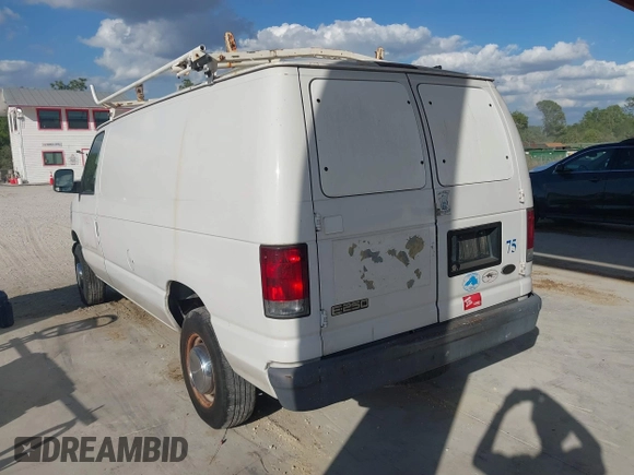 2005 Ford Econoline Cargo with VIN 1FTNE24L35HA46731, listed as a IAAI auction lot 41543863 with 179,541 mi miles. Bid and sale history available at carsss.com. Image 3.