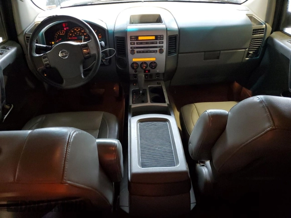 2007 Nissan Titan LE with VIN 1N6BA06A07N213482, listed as a Copart auction lot 51676285 with 184,796 mi miles and Salvage Title. Bid and sale history available at DreamBid. Image 8.