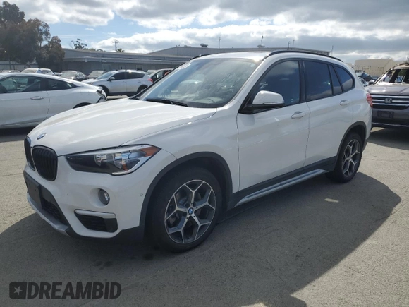 2017 BMW X1 sDrive28i with VIN WBXHU7C39H5H37756, listed as a Copart auction lot 50769975 with 82,479 mi miles and Salvage Title. Bid and sale history available at carsss.com. Image 1.