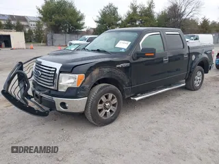 2011 Ford F-150 XL with VIN 1FTFW1EF4BFC28952, listed as a IAAI auction lot 41792908 with 122,460 mi miles. Bid and sale history available at carsss.com. Image 2.