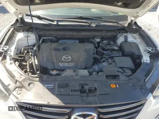 2016 Mazda CX-5 Grand Touring with VIN JM3KE4DY0G0819528, listed as a Copart auction lot 52343885 with 77,340 mi miles and Clean Title. Bid and sale history available at DreamBid. Image 12.